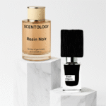 • Resin Noir smoky oud amber perfume bottle by Scentology • Resin Noir unisex smoky woody fragrance • Resin Noir dark resin oud perfume close up • Resin Noir amber tobacco woody perfume